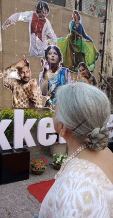 Manjushree Chatterjee looking at poster