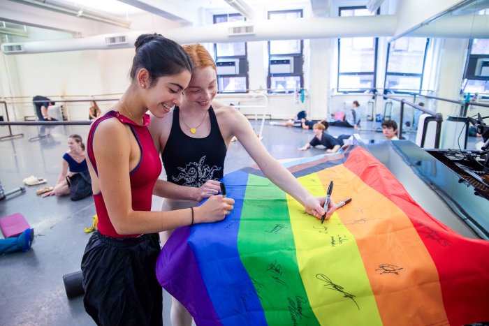 Signing the Pride Flag