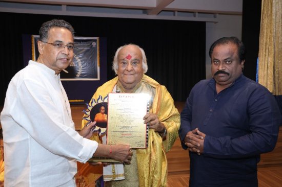 Guru Bhaskar Menon being felicitated